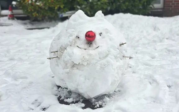 Schneemann im Winter in Duhnen beim Duhner Landhaus